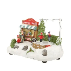 Carretto cioccolata, villaggio di Natale con luci