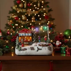 Carretto cioccolata, villaggio di Natale con luci