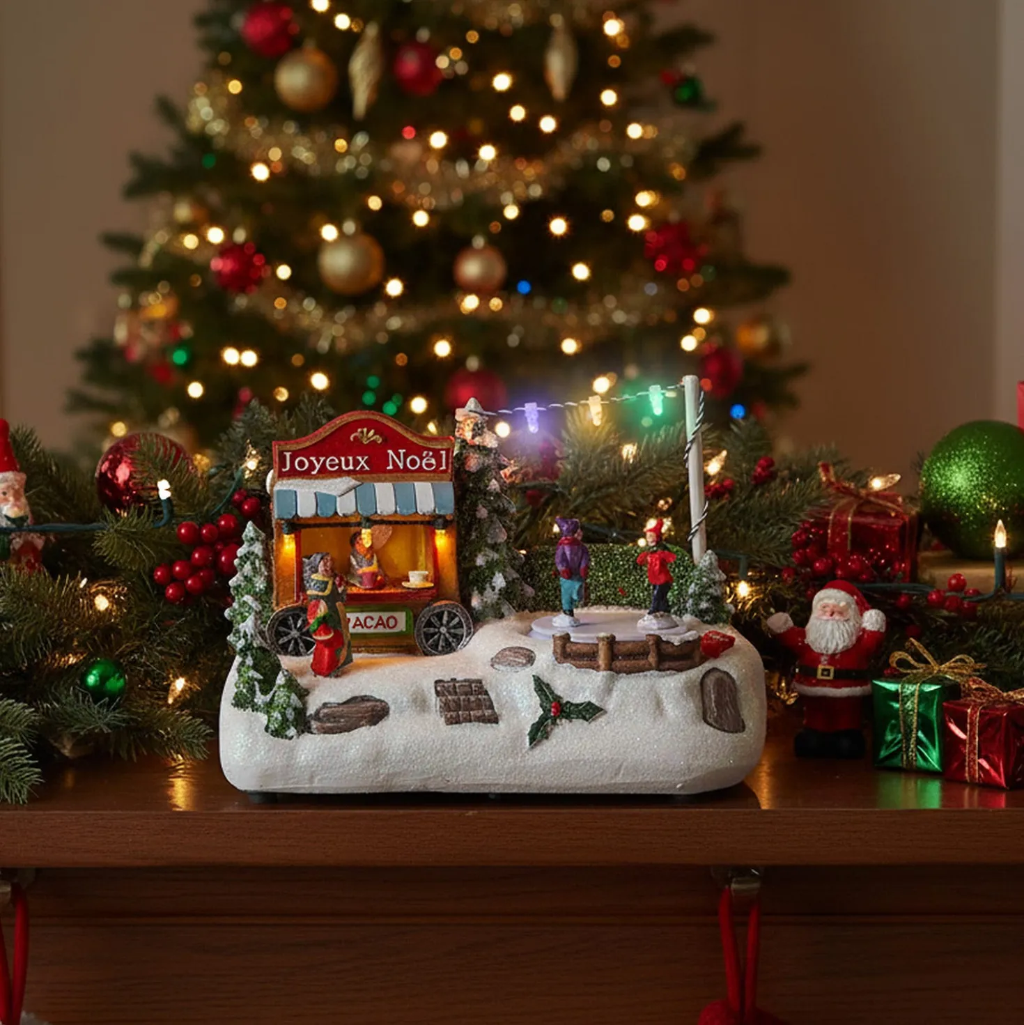 Carretto cioccolata, villaggio di Natale con luci