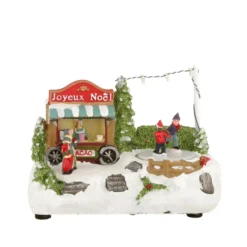 Carretto cioccolata, villaggio di Natale con luci
